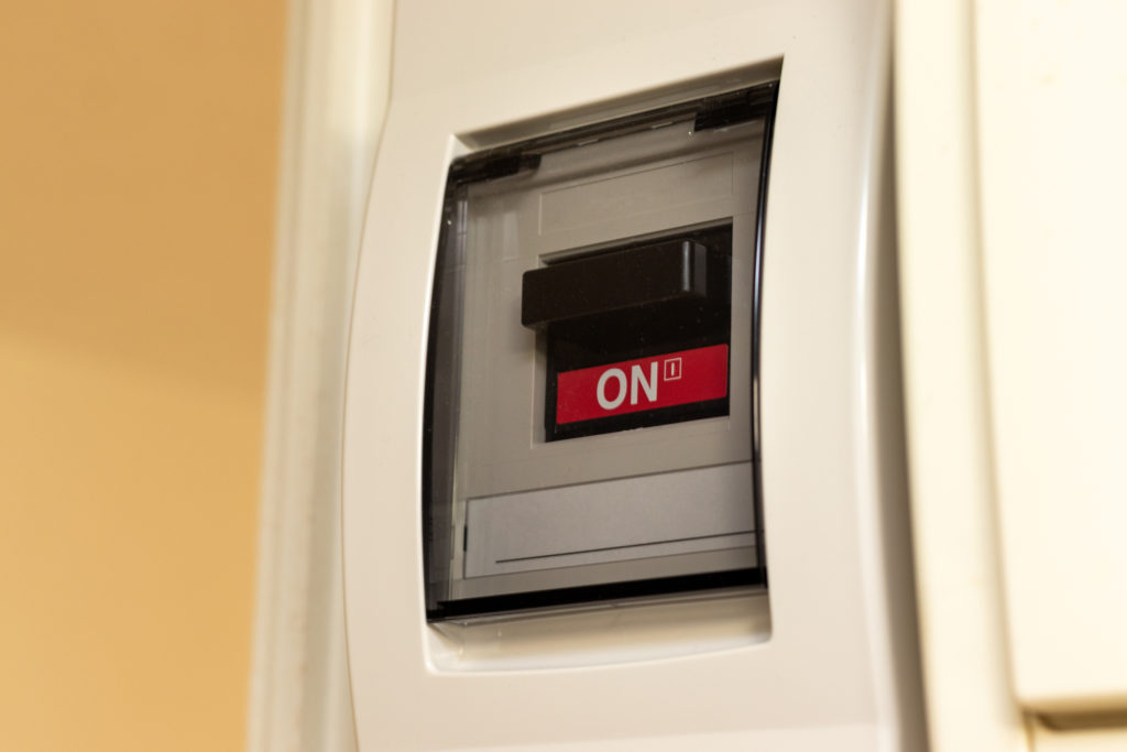 A main switch on a fuse board.