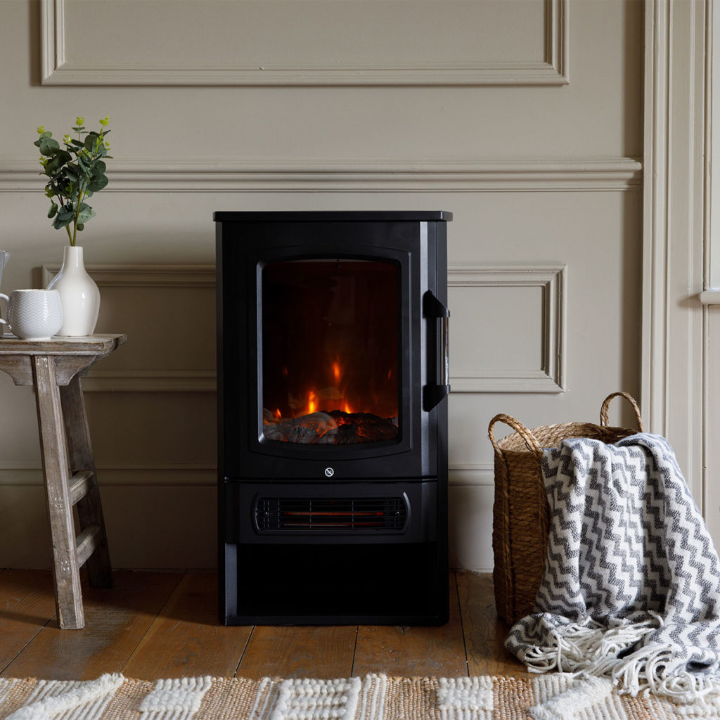 Black electric stove in sitting room